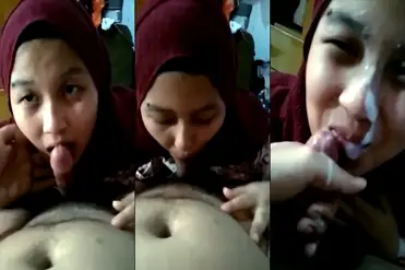 Bokep Indo Sepong Crot di Muka Cewe Jilbab poster